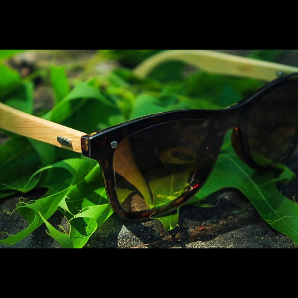 Handmade bamboo sunglasses with UV400 lenses.